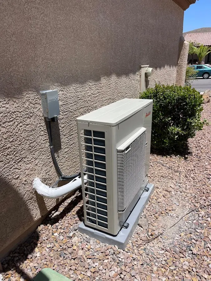 Residential air conditioning condenser unit in Weisenberg